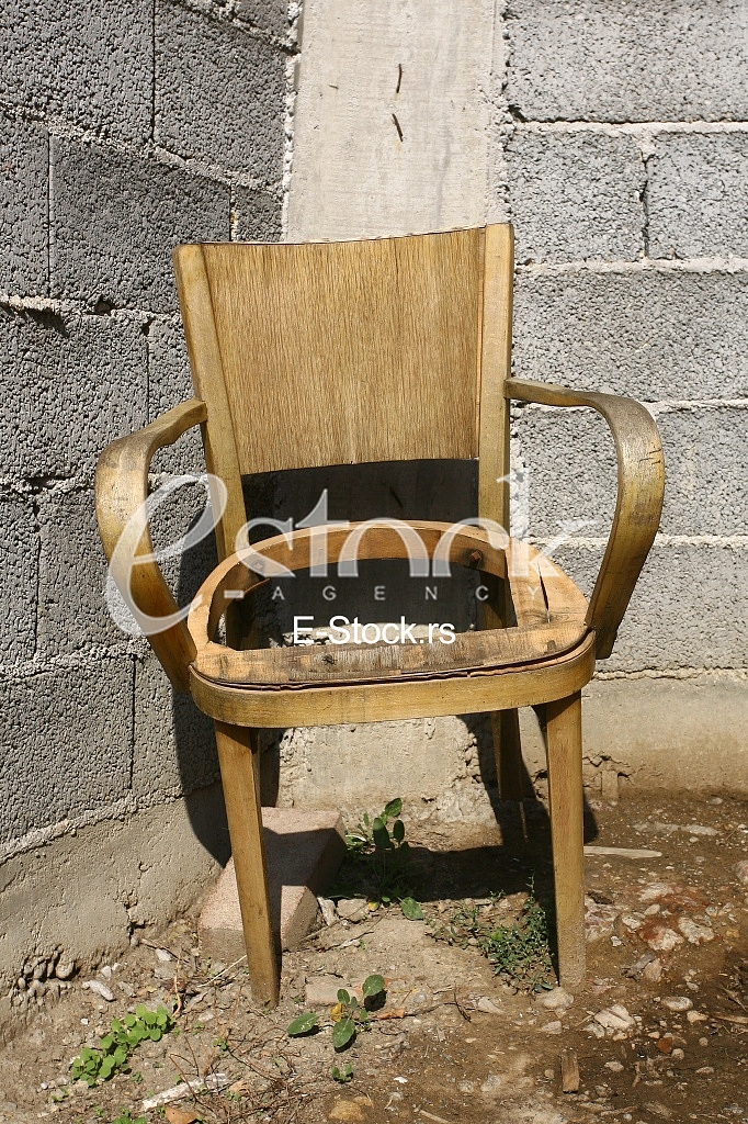 old chair near the old wall