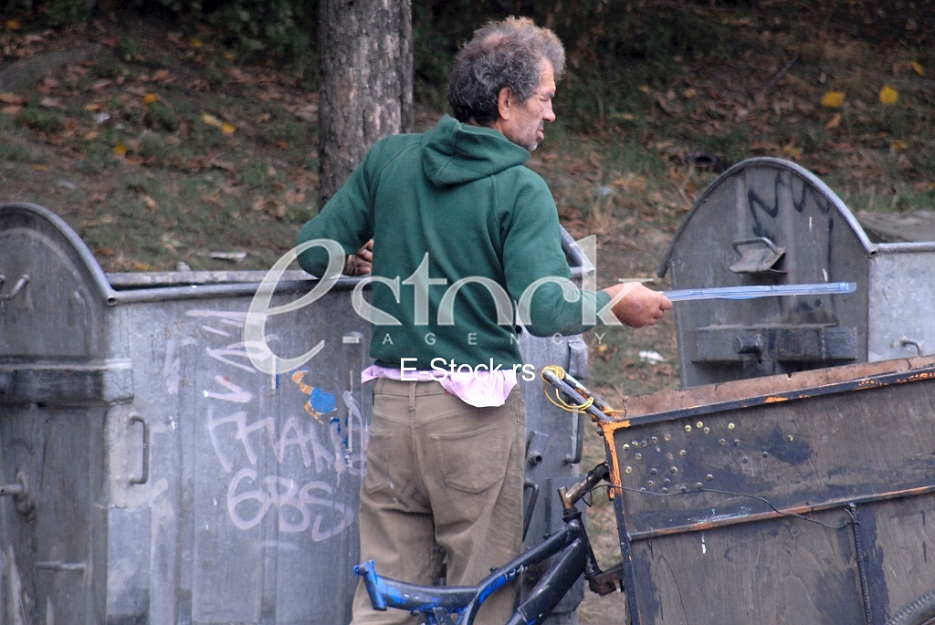 A man collects recyclable materials 