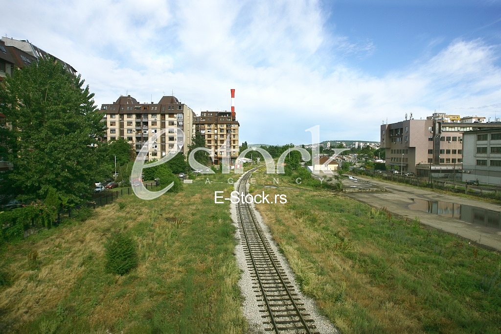Cargo train platform railway tracks in a rural scene