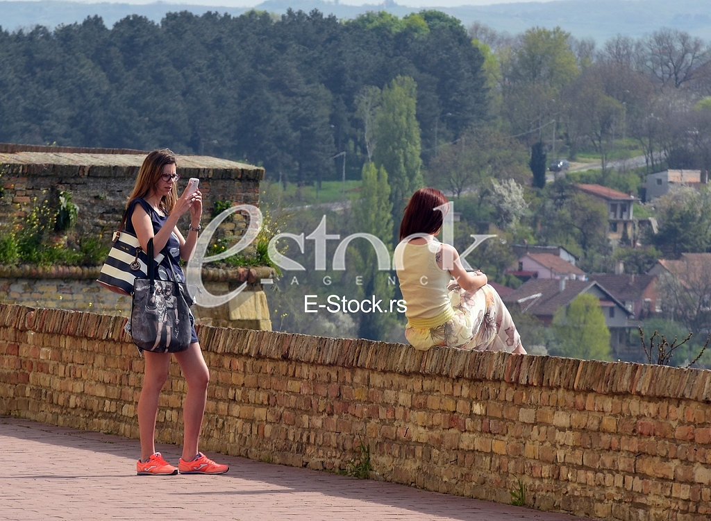 Girls enjoying at beautiful sunny spring day