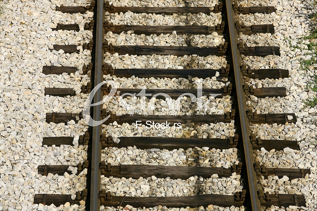 Cargo train platform railway tracks in a rural scene