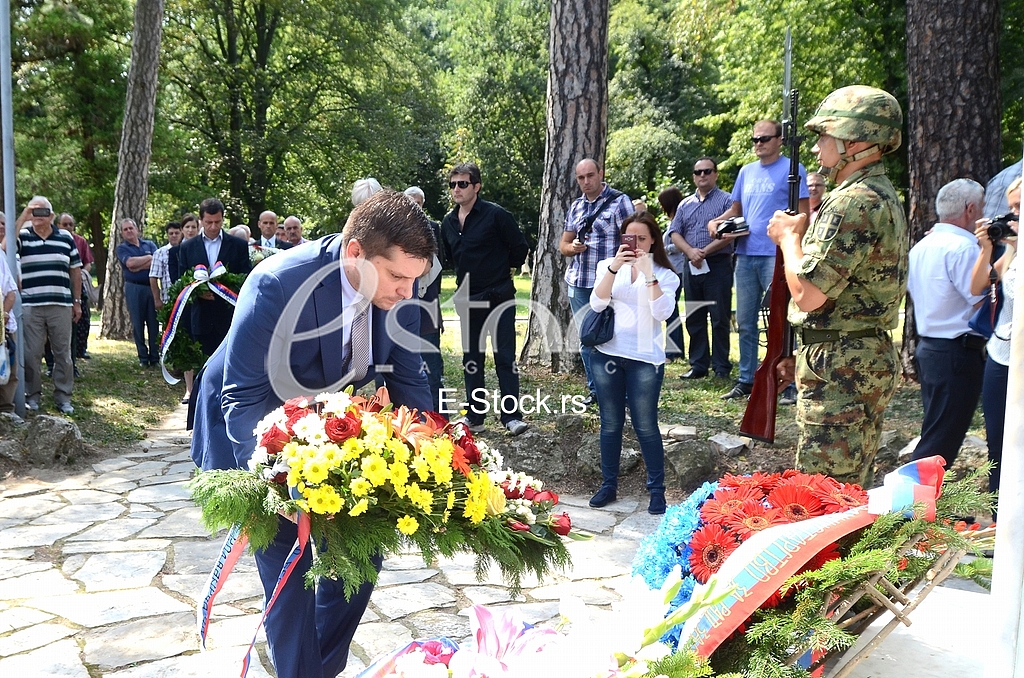 Laying a wreath at the monument to Archibald Reiss