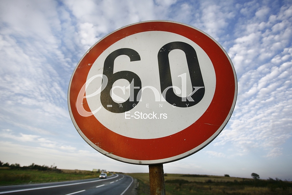 road sing speed limit on sixty