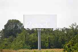 Empty billboard on background of sunset sky