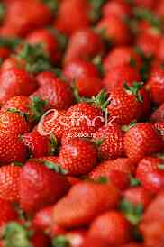 Strawberry fresh natural juicy strawberries to background on the street market
