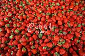 Strawberry fresh natural juicy strawberries to background on the street market
