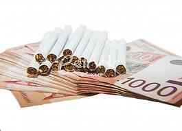 Thousand dinars bills and cigarette