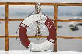 Classic life safety ship's ring boat, rubber life raft on the ship
