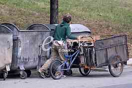 A man collects recyclable materials 