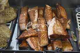 Preparing fish for eating.