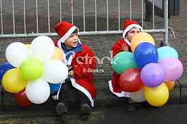 People in Santa Claus costumes take part in the race