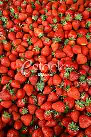 Strawberry fresh natural juicy strawberries to background on the street market

