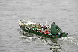 Fishing boat were running, small fisherman boat on the river
