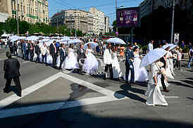 group wedding in front of City Assembly
