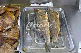 Preparing fish for eating.