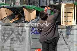 A man collects recyclable materials 