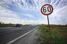 road sing speed limit on sixty