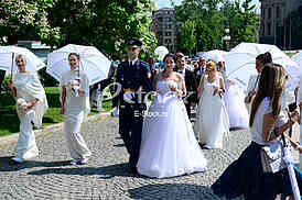 group wedding in front of City Assembly