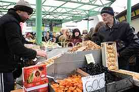 Selling food in the market.