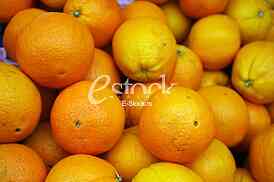 Fresh natural the orange to background on the street market

