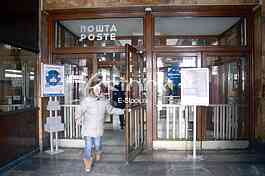 Playing giveaway and sending envelopes in the main post office. 