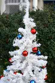 White Christmas tree with colorful ornaments