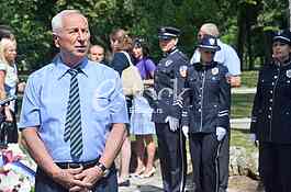 Laying a wreath at the monument to Archibald Reiss