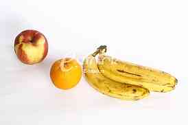 Fresh ripe bananas bunch and orange apple isolated on white background