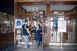Playing giveaway and sending envelopes in the main post office. 