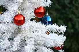 White Christmas tree with colorful ornaments