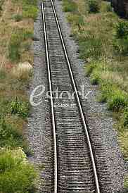 Cargo train platform railway tracks in a rural scene