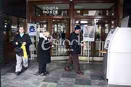 Playing giveaway and sending envelopes in the main post office. 