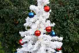 White Christmas tree with colorful ornaments