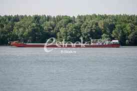 push boat Barge pushed by towboat on the river freighter ship with sand