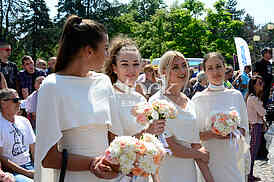 group wedding in front of City Assembly