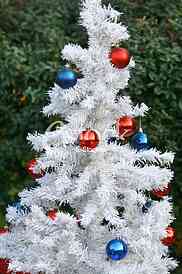 White Christmas tree with colorful ornaments