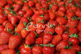 Strawberry fresh natural juicy strawberries to background on the street market
