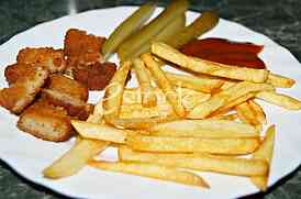 french fries with pickles and fried fish