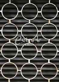 decorative iron window pattern, metal protection on the window, Metal net circle texture background networks with holes