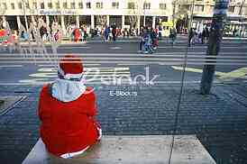 People in Santa Claus costumes take part in the race