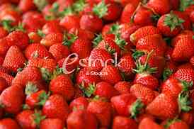 Strawberry fresh natural juicy strawberries to background on the street market
