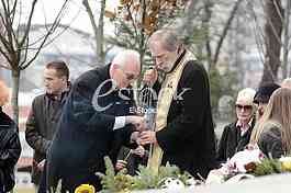 At the cemetery, giving importance to the  singer Miki Jevremovic.