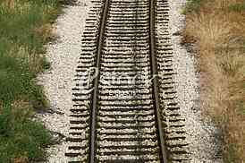 Cargo train platform railway tracks in a rural scene