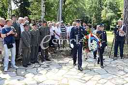 Laying a wreath at the monument to Archibald Reiss