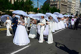 group wedding in front of City Assembly