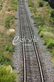 Cargo train platform railway tracks in a rural scene