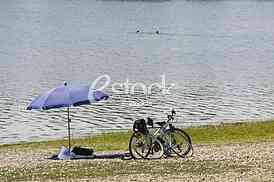 sunshade umbrella on lake Beach