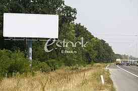 Empty billboard on background of sunset sky