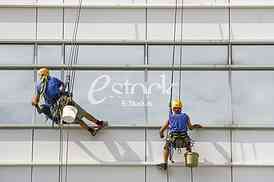 window cleaners on a building