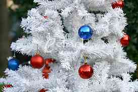 White Christmas tree with colorful ornaments